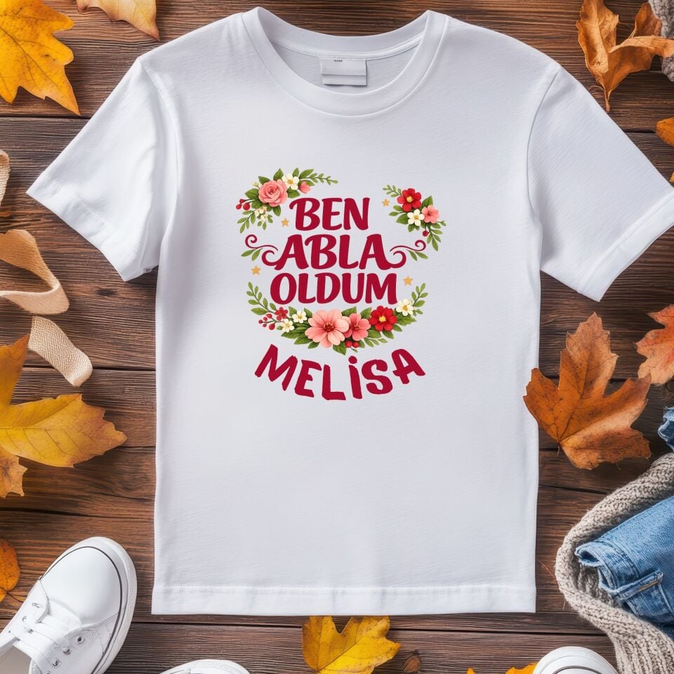 Kişiye Özel İsimli Çocuk Tişörtü – ''Ben Abla Oldum'' Çiçek Çelenkli Kardeş Doğum Duyurusu Pamuklu Çocuk Tişört