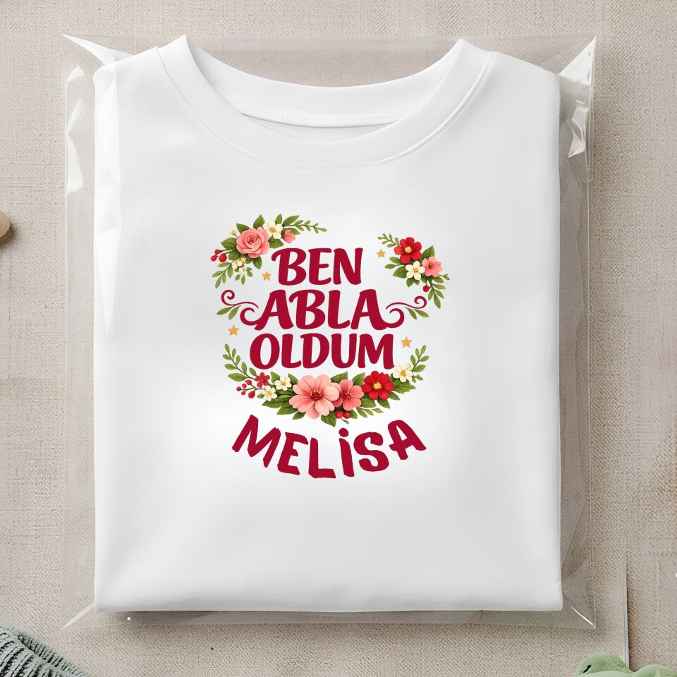 Kişiye Özel İsimli Çocuk Tişörtü – ''Ben Abla Oldum'' Çiçek Çelenkli Kardeş Doğum Duyurusu Pamuklu Çocuk Tişört